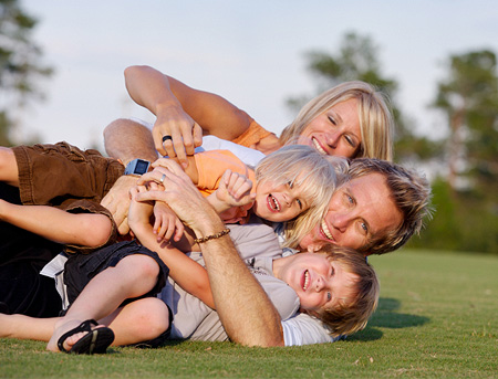 Family-playing-in-grass1